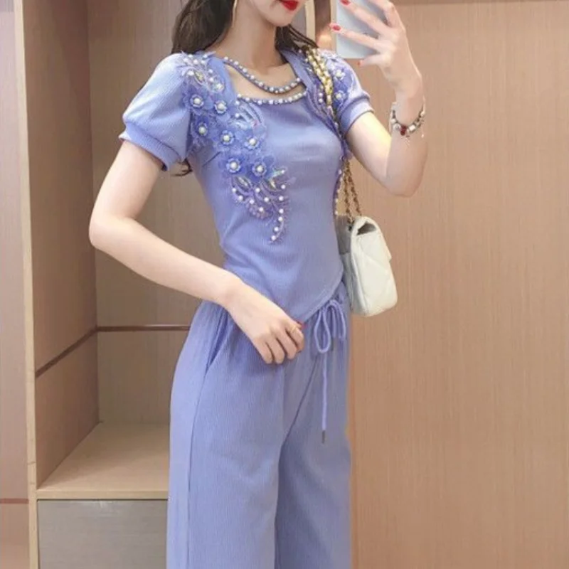 Pantaloni da donna a gamba lar - Summer Clothing Wholesale recensione e prezzo